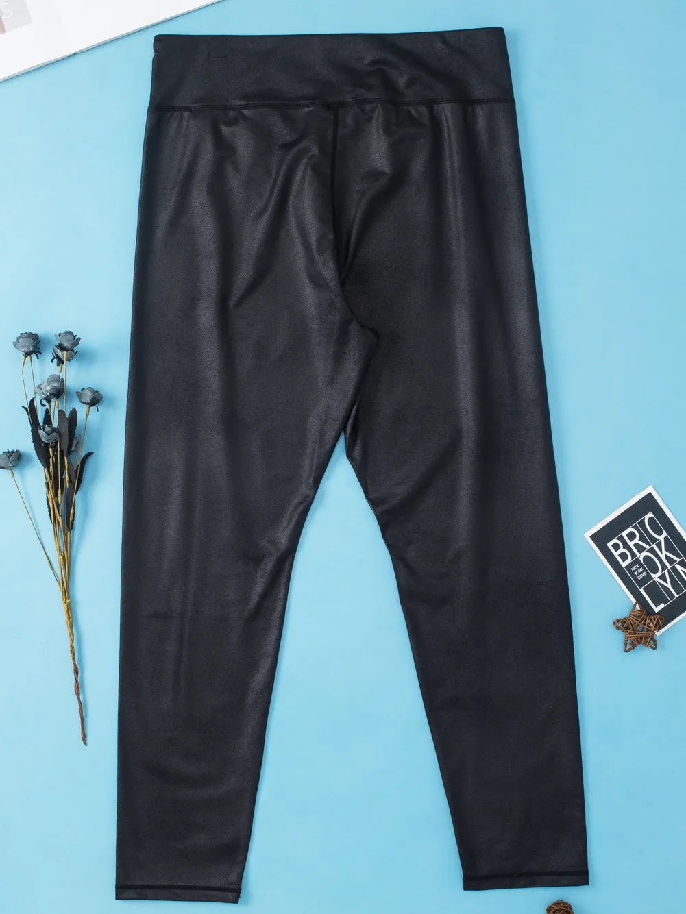 Black Plus Size Crossover Faux Leather Leggings