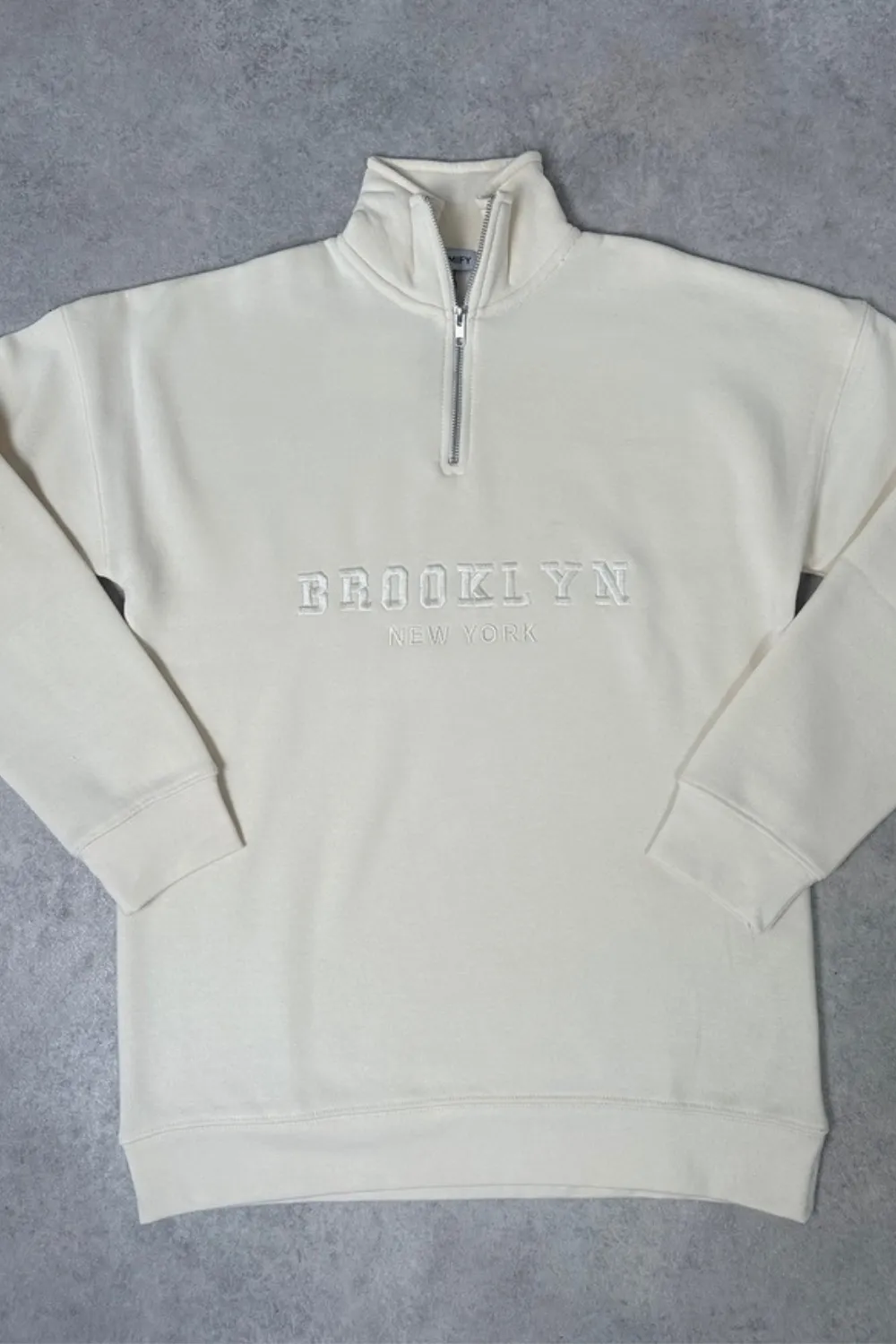 Brooklyn ecru embroidered 3/4 zip sweater