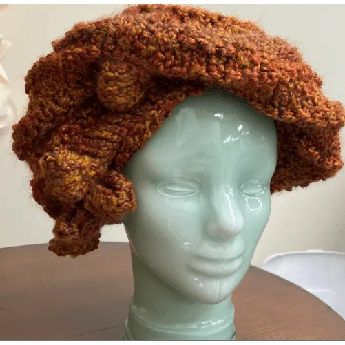 Handknit free form non wool Hat in rust tones and textures