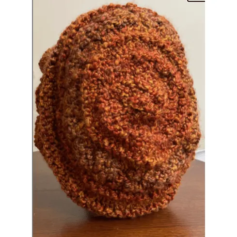 Handknit free form non wool Hat in rust tones and textures