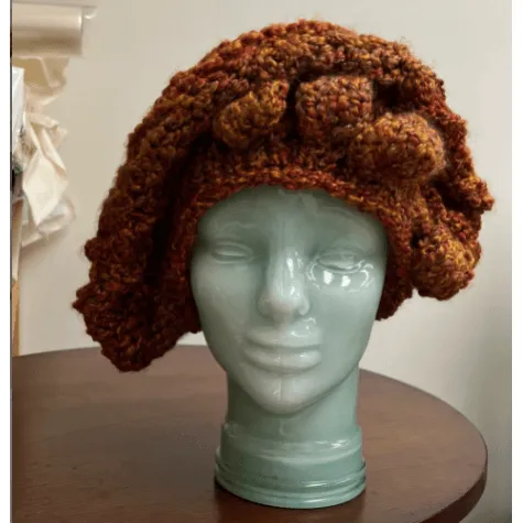 Handknit free form non wool Hat in rust tones and textures