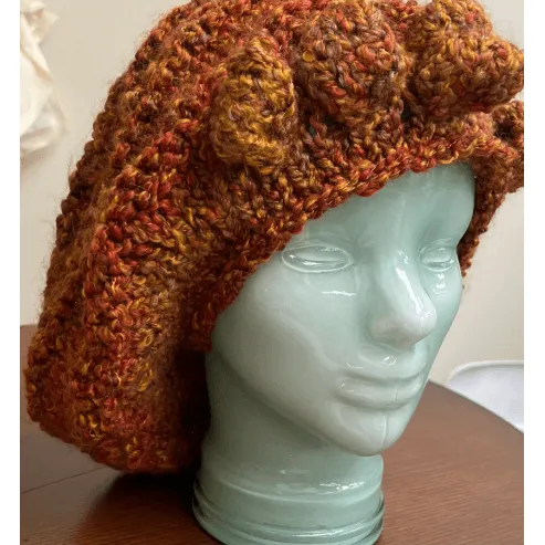 Handknit free form non wool Hat in rust tones and textures