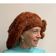 Handknit free form non wool Hat in rust tones and textures