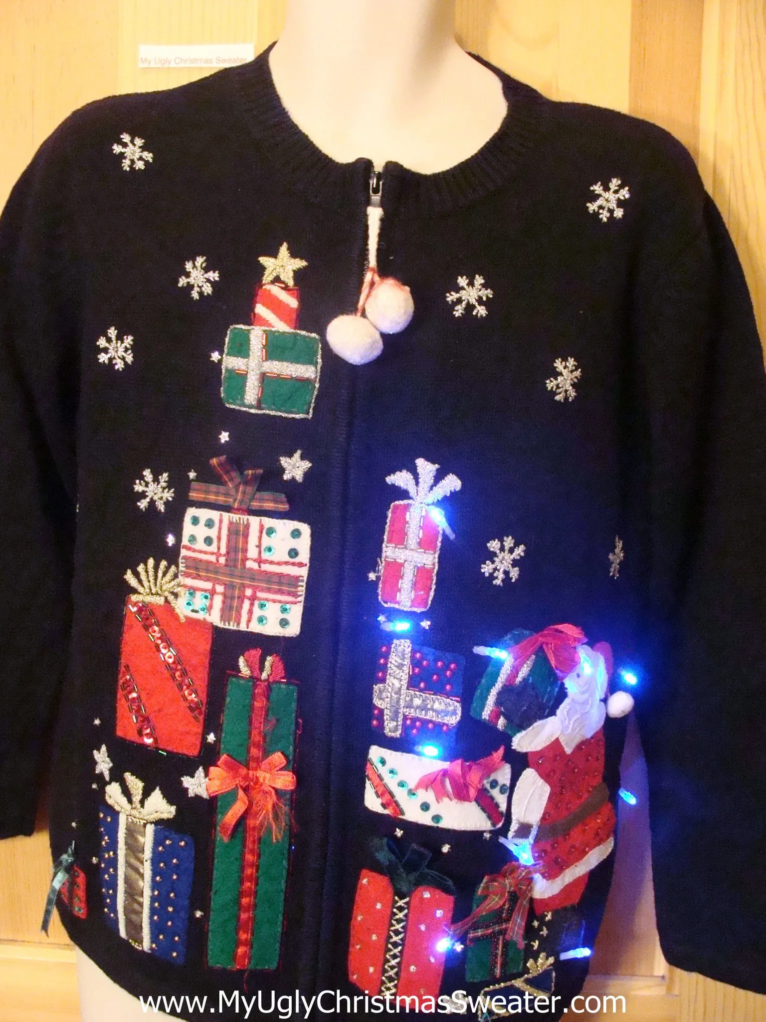 Need to Buy Christmas Sweaters? Light Up Sweater Santa and Gifts